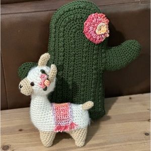 Hand crocheted floral llama & pillow set
